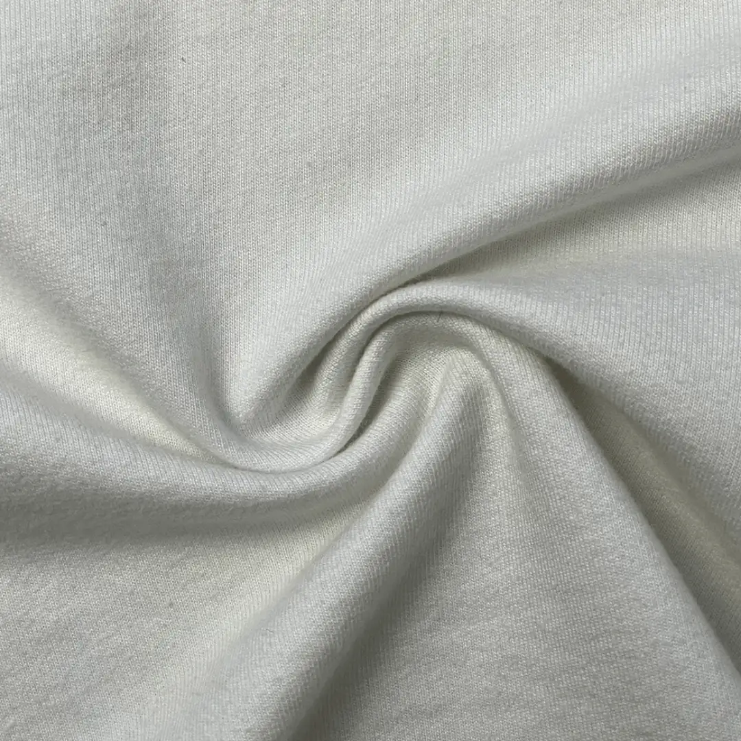 “Bahan Baby Terry PE berbagai gramasi dengan permukaan halus dan bagian dalam berbulu lembut.