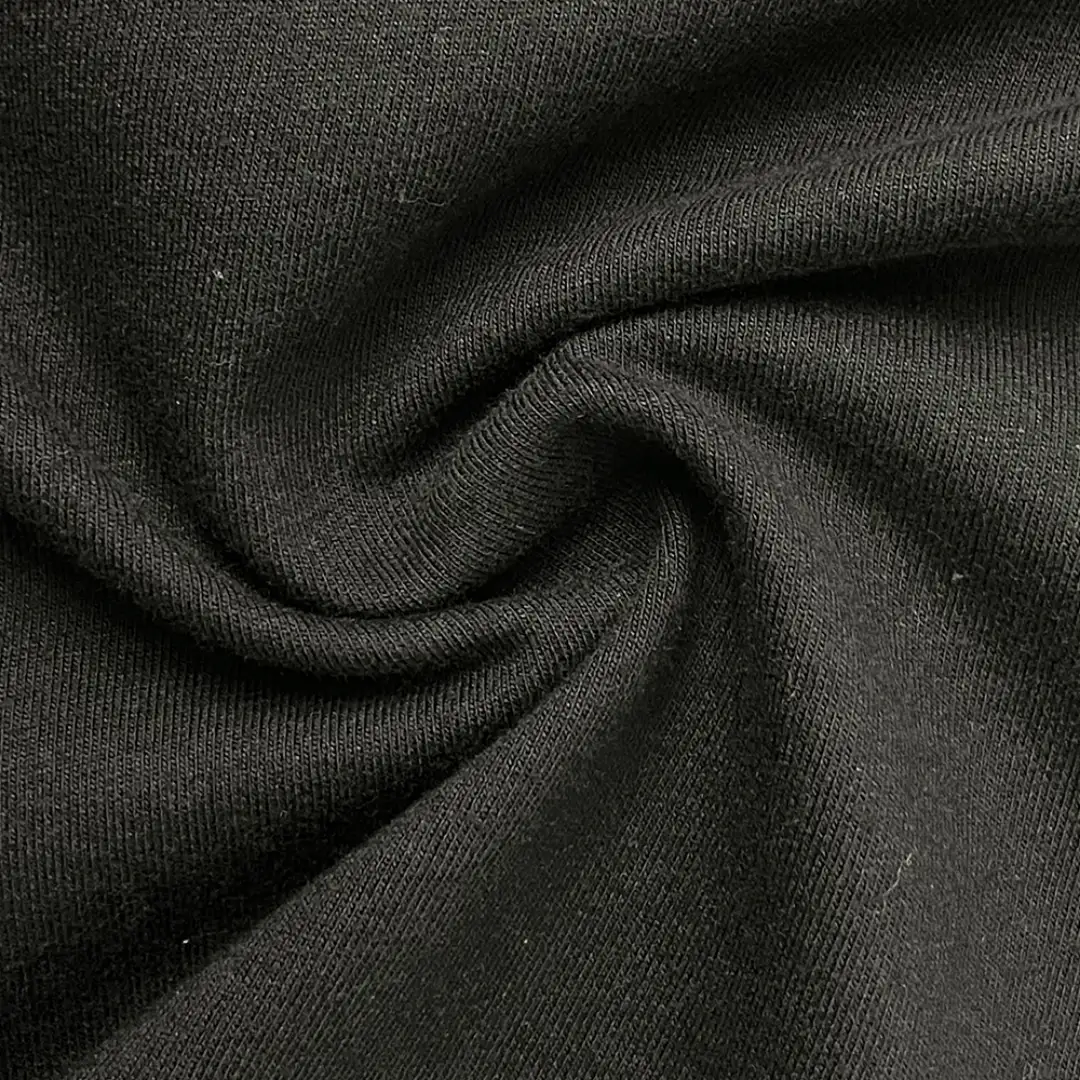 Kain Baby Terry Polly PE all gramasi dengan tekstur lembut dan ringan untuk bahan sweater dan pakaian anak.