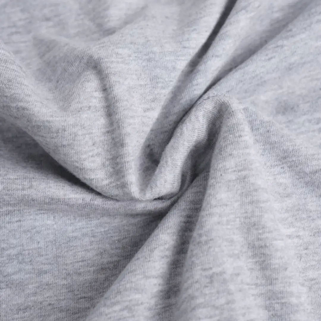 Kain DK Misty bertekstur lembut dengan serat rapat dan permukaan sedikit mengilat.
